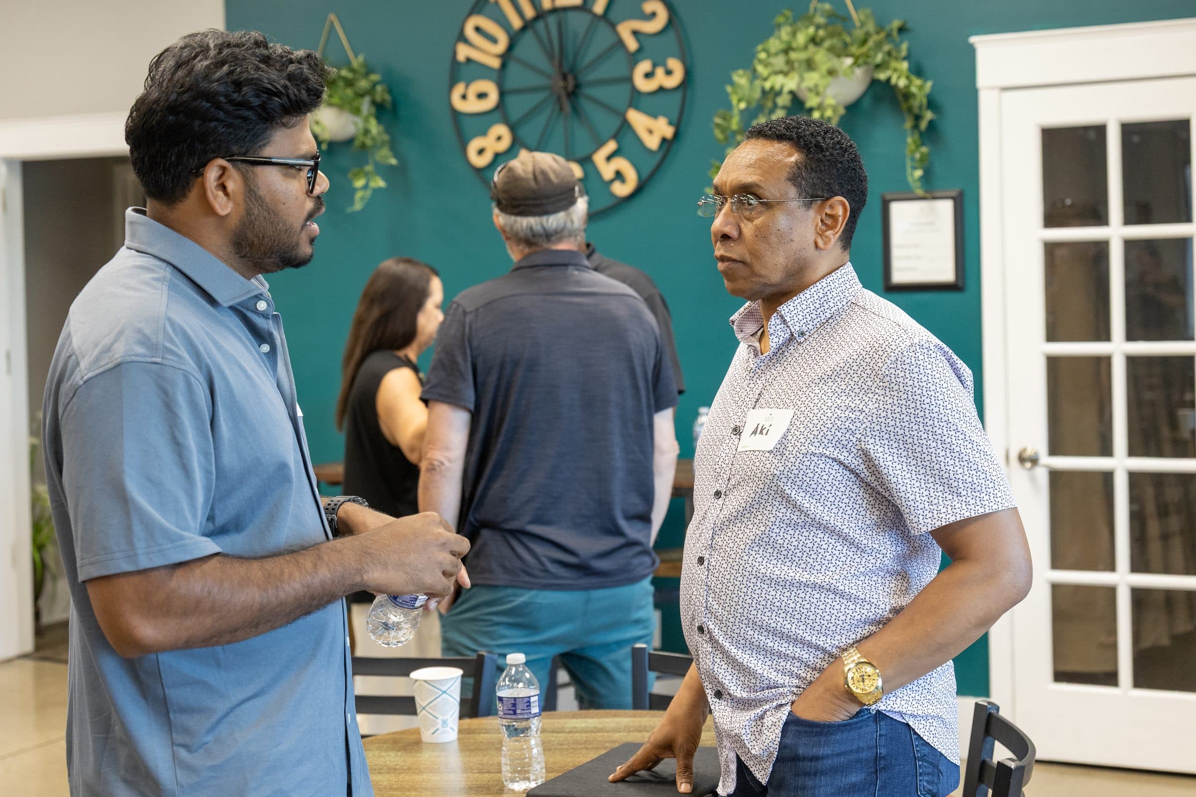 Kansas City professionals connecting in conversation at a New Life Networking event