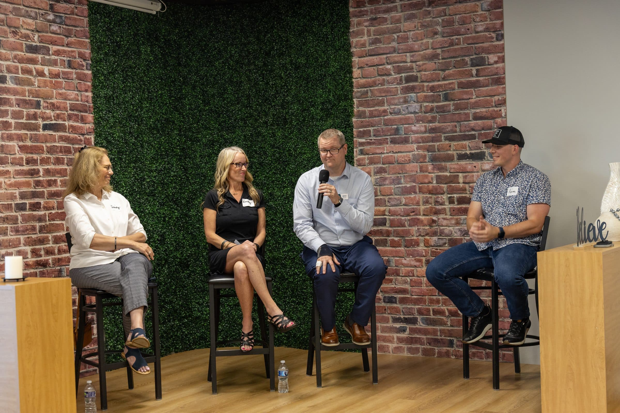 The New Life Networking panel of Kansas City business owners sharing insights at a monthly event